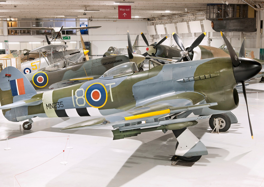 Hawker Typhoon został skonstruowany jako myśliwiec przechwytujący, ale doskonale sprawdził się w atakowaniu celów naziemnych. Jedyny zachowany egzemplarz (MN235) znajduje się w RAF Museum w Hendon w Wielkiej Brytanii.